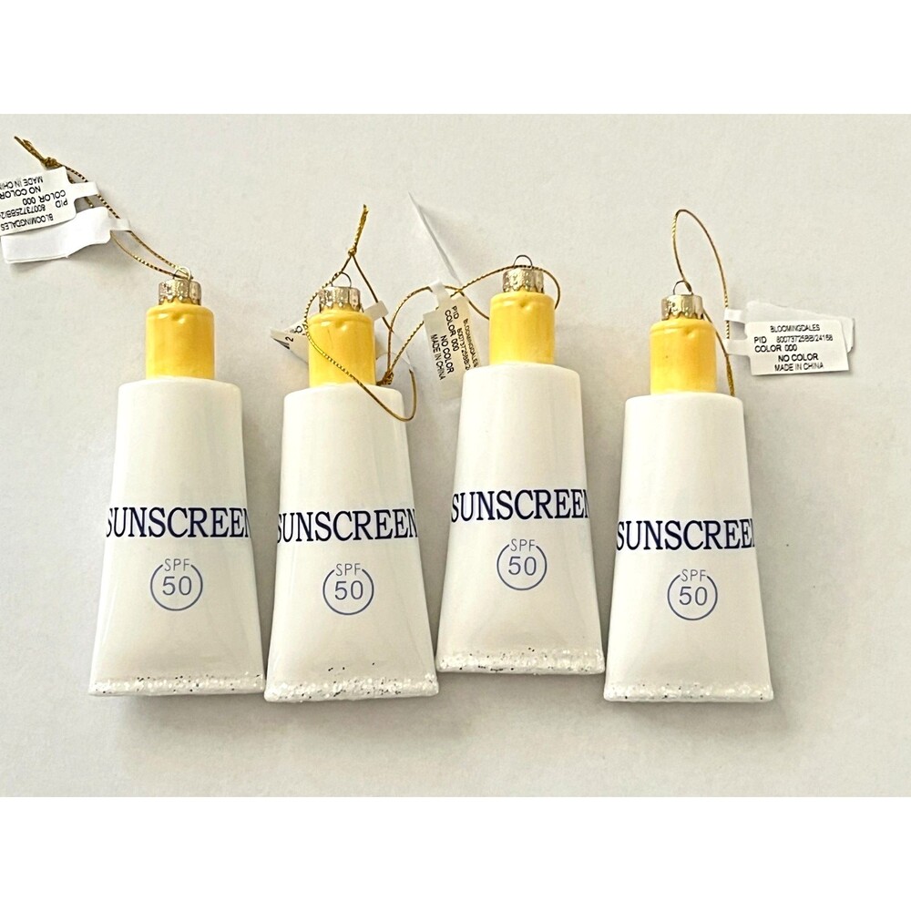 NWT Bloomingdales 4pc Set Sunscreen Ornaments Glass Christmas Tree Spa Resort